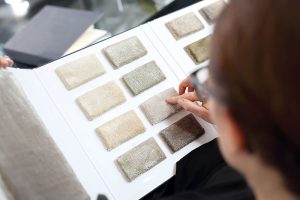 Woman choosing the perfect carpet for home - Carpet Store Melbourne