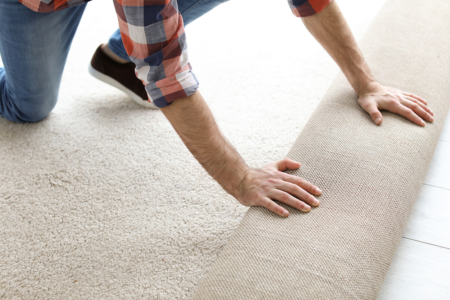 Professional carpet installation in a residential living room in Melbourne